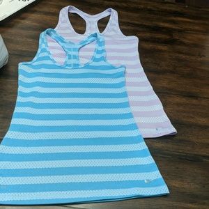 2 nike tanks